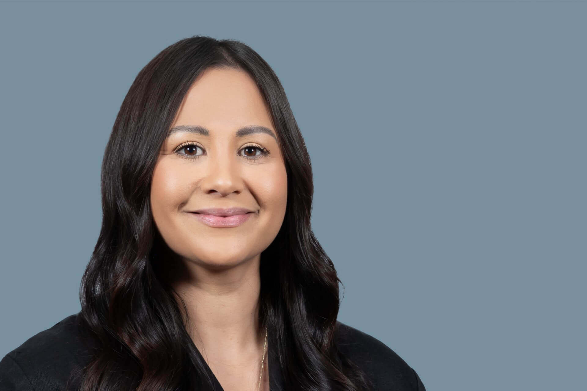 Headshot of a women looking professional